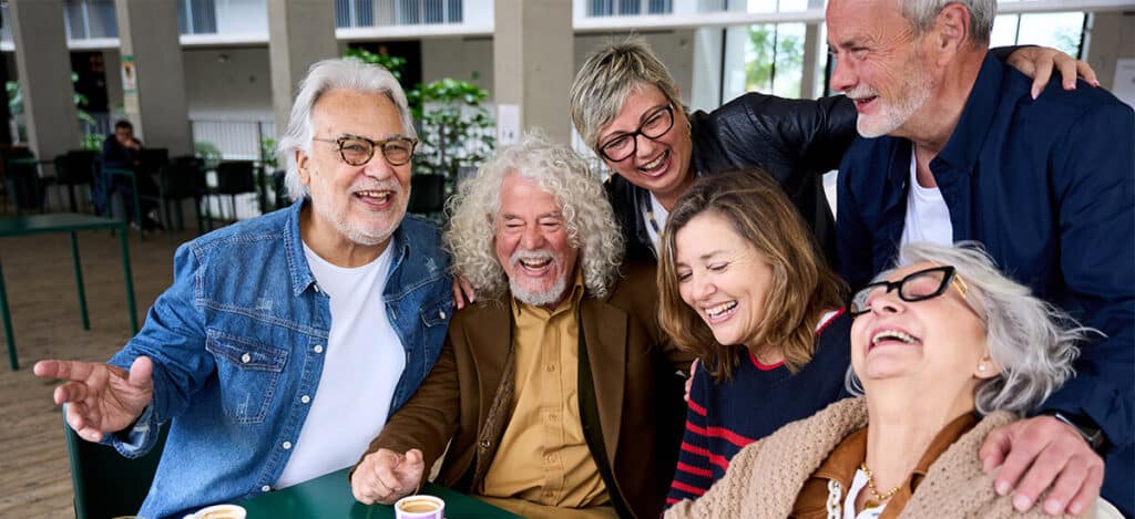 Happy family group celebrate together in friendship with fun and laugh